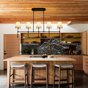 Rhodas Linear Chandelier in brass by Blush Lighting