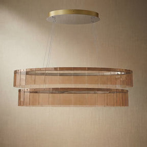 Yiosi Astor 59 inch oval handmade glass linear chandelier with antique brass finish — modern dining pendant
